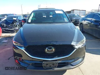 2021 Mazda CX-5 Grand Touring with VIN JM3KFADM1M0406098, listed as a IAAI auction lot 41654735 with 33,050 mi miles. Bid and sale history available at carsss.com. Image 12.