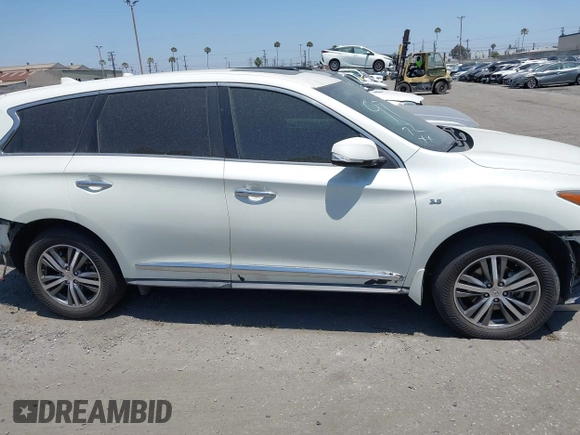 2019 Infiniti QX60 Pure with VIN 5N1DL0MN0KC569636, listed as a IAAI auction lot 42218565 with 47,971 mi miles and . Bid and sale history available at DreamBid. Image 14.