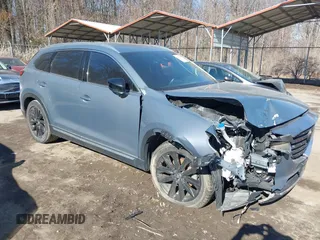 2021 Mazda CX-9 Grand Touring with VIN JM3TCBDY1M0505302, listed as a IAAI auction lot 41649151 with 67,183 mi miles and . Bid and sale history available at carsss.com. Image 1.