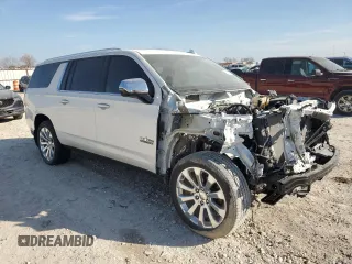 2023 Chevrolet Suburban Premier with VIN 1GNSCFKD2PR106790, listed as a Copart auction lot 46873635 with 31,972 mi miles and Salvage title. Bid and sale history available at DreamBid. Image 4.