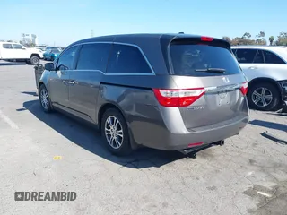 2011 Honda Odyssey EX-L with VIN 5FNRL5H68BB083492, listed as a IAAI auction lot 42087699 with 155,141 mi miles and . Bid and sale history available at carsss.com. Image 3.