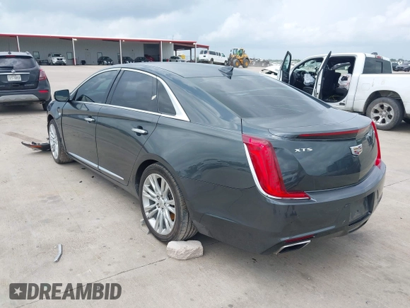 2019 Cadillac XTS Luxury with VIN 2G61M5S33K9113899, listed as a IAAI auction lot 42063952 with 148,773 mi miles and . Bid and sale history available at DreamBid. Image 3.
