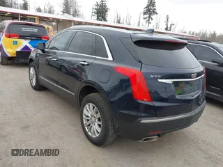2017 Cadillac XT5 FWD with VIN 1GYKNARS2HZ188557, listed as a IAAI auction lot 41840764 with 104,524 mi miles. Bid and sale history available at carsss.com. Image 3.