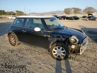 2004 MINI Hardtop with VIN WMWRC33484TJ59008, listed as a Copart auction lot 46003105 with 83,303 mi miles and Salvage Title. Bid and sale history available at DreamBid. Image 4.