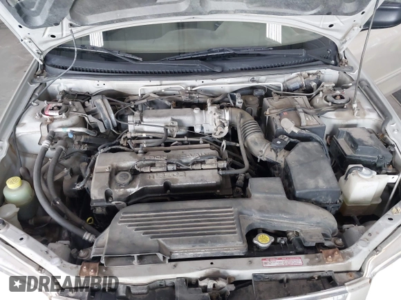 2000 Mazda Protege DX with VIN JM1BJ2221Y0239987, listed as a IAAI auction lot 42092488 with 140,756 mi miles and . Bid and sale history available at DreamBid. Image 10.