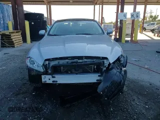 2015 Jaguar XJ Portfolio z VIN SAJWJ2GD9F8V81151, wystawiony jako Copart lot #45724765 z przebiegiem 77 392 mil mil oraz Szkoda całkowita • Salvage title. Historia ofert i sprzedaży dostępna na DreamBid. Obrazek 14.