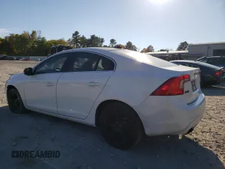 2015 Volvo S60 T5 Premier with VIN YV1612TB2F1314634, listed as a Copart auction lot 77180004 with 167,617 mi miles and Salvage Title. Bid and sale history available at carsss.com. Image 2.