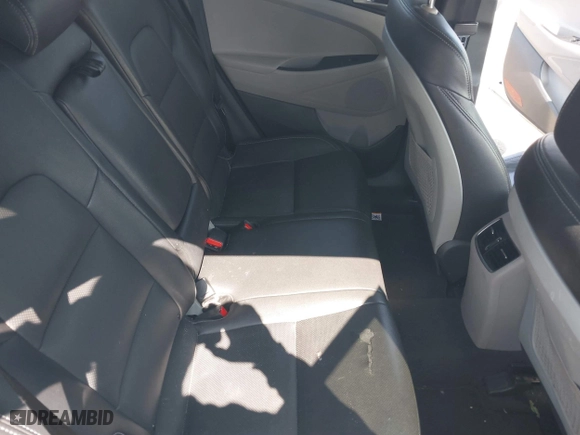 2018 Hyundai Tucson Value with VIN KM8J3CA26JU697712, listed as a IAAI auction lot 40323457 with 53,175 mi miles. Bid and sale history available at carsss.com. Image 8.