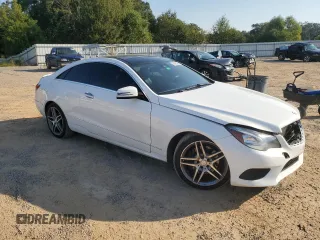 2015 Mercedes-Benz E 400 with VIN WDDKJ6HB2FF298934, listed as a Copart auction lot 74884344 with 157,841 mi miles and Salvage title. Bid and sale history available at DreamBid. Image 4.