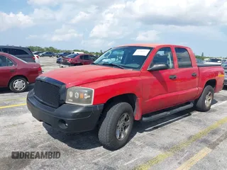 2006 Dodge Dakota SLT with VIN 1D7HE48K06S517772, listed as a IAAI auction lot 41946417 with 255,236 mi miles and . Bid and sale history available at carsss.com. Image 2.