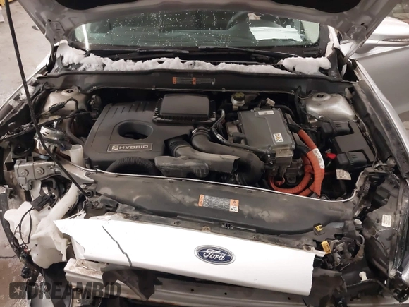 2016 Ford Fusion SE Hybrid z VIN 3FA6P0LU1GR304166, wystawiony jako IAAI lot #41932720 z przebiegiem 68 058 mil mil oraz . Historia ofert i sprzedaży dostępna na DreamBid. Obrazek 10.