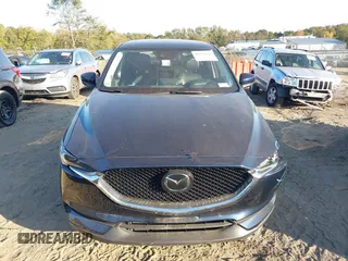 2021 Mazda CX-5 Grand Touring Reserve with VIN JM3KFBAYXM0465762, listed as a IAAI auction lot 40728368 with 30,667 mi miles. Bid and sale history available at carsss.com. Image 12.
