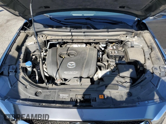 2019 Mazda CX-5 Grand Touring with VIN JM3KFADM2K0665356, listed as a Copart auction lot 51886685 with 44,760 mi miles and Salvage Title. Bid and sale history available at carsss.com. Image 12.