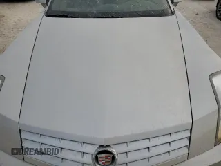 2004 Cadillac XLR z VIN 1G6YV34A045603308, wystawiony jako Copart lot #75459524 z przebiegiem Nie podano mil oraz Szkody całkowita. Historia ofert i sprzedaży dostępna na DreamBid. Obrazek 11.