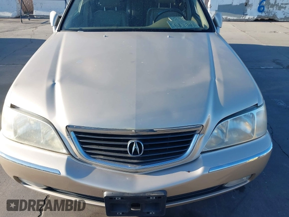 1999 Acura RL with VIN JH4KA9661XC005883, listed as a IAAI auction lot 40560595 with 165,195 mi miles. Bid and sale history available at carsss.com. Image 6.