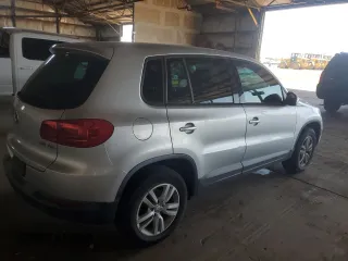 2013 Volkswagen Tiguan S with VIN WVGAV3AX8DW576243, listed as a Copart auction lot 62882635 with 115,113 mi miles and Clean title. Bid and sale history available at DreamBid. Image 3.