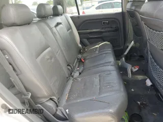 2005 Honda Pilot EX-L z VIN 2HKYF18785H570914, wystawiony jako Copart lot #57335335 z przebiegiem 277 670 mil mil oraz Czysty tytuł • Clean title. Historia ofert i sprzedaży dostępna na DreamBid. Obrazek 11.