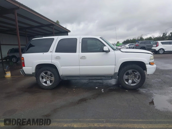 2002 Chevrolet Tahoe Z71 with VIN 1GNEK13Z22R234274, listed as a IAAI auction lot 41543866 with 191,848 mi miles. Bid and sale history available at carsss.com. Image 13.