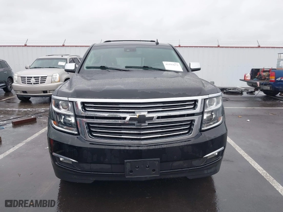 2017 Chevrolet Suburban Premier with VIN 1GNSKJKC4HR162261, listed as a IAAI auction lot 41593672 with 100,136 mi miles. Bid and sale history available at carsss.com. Image 13.