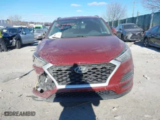 2020 Hyundai Tucson Value with VIN KM8J3CA42LU149811, listed as a IAAI auction lot 41642255 with 60,936 mi miles. Bid and sale history available at carsss.com. Image 11.