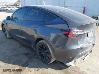 2021 Tesla Model Y Long Range with VIN 5YJYGDEE8MF278212, listed as a IAAI auction lot 41639320 with 53,707 mi miles. Bid and sale history available at carsss.com. Image 3.