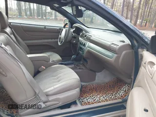 2004 Chrysler Sebring LXi with VIN 1C3EL55R84N390988, listed as a IAAI auction lot 41611093 with 91,577 mi miles and . Bid and sale history available at DreamBid. Image 5.