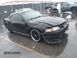 2003 Ford Mustang Deluxe z VIN 1FAFP444X3F324607, wystawiony jako IAAI lot #41543063 z przebiegiem 181 148 mil mil oraz . Historia ofert i sprzedaży dostępna na DreamBid. Obrazek 1.