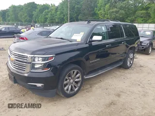 2015 Chevrolet Suburban LTZ with VIN 1GNSCKKCXFR731873, listed as a IAAI auction lot 42069917 with 108,963 mi miles and . Bid and sale history available at DreamBid. Image 18.