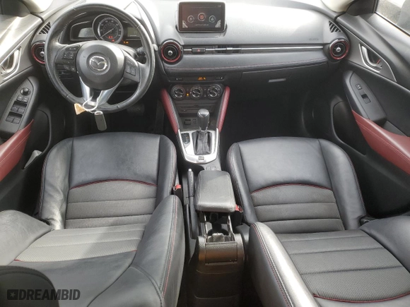 2016 Mazda CX-3 Touring with VIN JM1DKFC70G0136632, listed as a Copart auction lot 82004974 with 87,249 mi miles and Salvage Title. Bid and sale history available at carsss.com. Image 8.