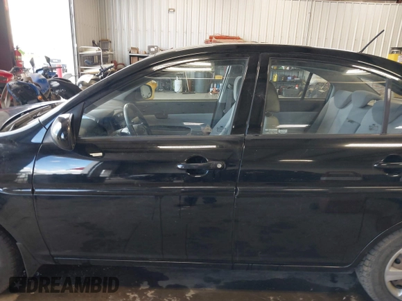 2011 Hyundai Accent GLS z VIN KMHCN4AC1BU620314, wystawiony jako IAAI lot #42228847 z przebiegiem 144 313 mil mil oraz . Historia ofert i sprzedaży dostępna na DreamBid. Obrazek 14.