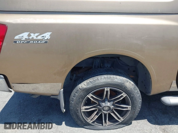 2005 Nissan Titan LE with VIN 1N6AA07B95N508001, listed as a IAAI auction lot 42656008 with 196,542 mi miles and . Bid and sale history available at DreamBid. Image 14.