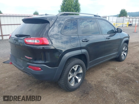 2016 Jeep Cherokee Trailhawk with VIN 1C4PJMBS4GW169267, listed as a IAAI auction lot 42597291 with 79,258 mi miles and . Bid and sale history available at DreamBid. Image 4.