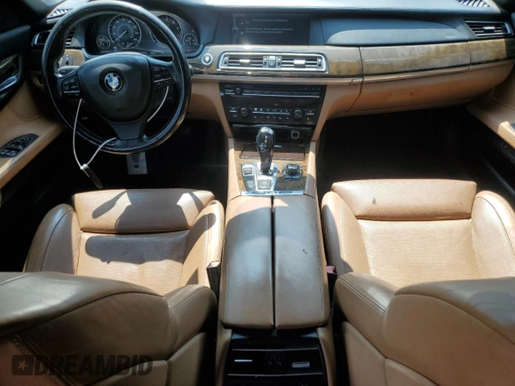 2011 BMW 7 Series с VIN WBAKB0C58BCY40214, выставлен на аукционе Copart как лот 64976145 с пробегом 74 319 миль миль и Чистый • Clean title. История ставок и продаж доступна на DreamBid. Изображение 8.