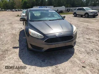 2016 Ford Focus SE z VIN 1FADP3F23GL355587, wystawiony jako Copart lot #53462345 z przebiegiem 101 628 mil mil oraz Szkoda całkowita • Salvage title. Historia ofert i sprzedaży dostępna na DreamBid. Obrazek 13.