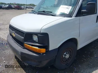 2012 Chevrolet Express Cargo Van with VIN 1GCSGAFX5C1145743, listed as a IAAI auction lot 42027282 with 202,770 mi miles. Bid and sale history available at carsss.com. Image 6.