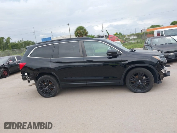 2021 Honda Pilot Special Edition with VIN 5FNYF5H27MB043732, listed as a IAAI auction lot 39777255 with 56,087 mi miles and . Bid and sale history available at DreamBid. Image 13.