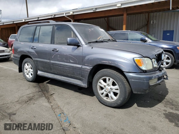 2003 Lexus LX 470 z VIN JTJHT00W633531685, wystawiony jako Copart lot #49729305 z przebiegiem 237 447 mil mil oraz Szkoda całkowita • Salvage title. Historia ofert i sprzedaży dostępna na DreamBid. Obrazek 4.