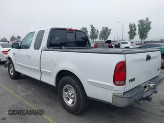 2000 Ford F-150 XL with VIN 1FTRX17L4YNA39407, listed as a IAAI auction lot 42141350 with 82,824 mi miles and . Bid and sale history available at DreamBid. Image 3.