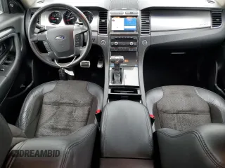 2012 Ford Taurus SHO with VIN 1FAHP2KT2CG141879, listed as a Copart auction lot 56558365 with 105,230 mi miles and Salvage title. Bid and sale history available at DreamBid. Image 8.