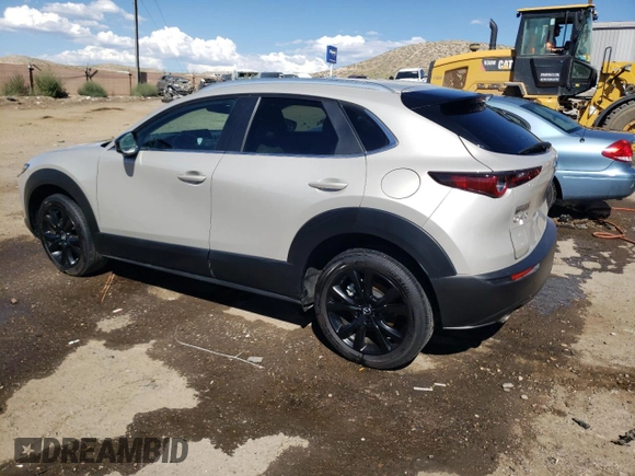2022 Mazda CX-30 2.5 Turbo with VIN 3MVDMBAY1NM447753, listed as a Copart auction lot 68148334 with 5,180 mi miles and Salvage Title. Bid and sale history available at DreamBid. Image 2.