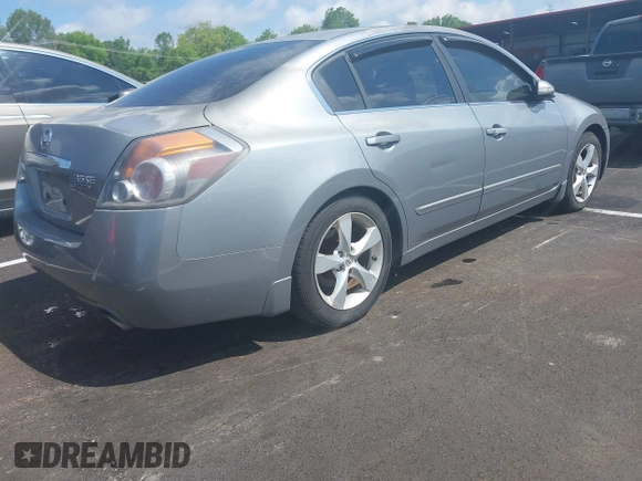 2008 Nissan Altima SE z VIN 1N4BL21E88N436802, wystawiony jako IAAI lot #42197865 z przebiegiem 173 898 mil mil oraz . Historia ofert i sprzedaży dostępna na DreamBid. Obrazek 4.