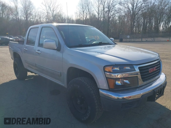 2012 GMC Canyon SLE1 with VIN 1GTH6MFE2C8106354, listed as a IAAI auction lot 41910921 with 127,812 mi miles. Bid and sale history available at carsss.com. Image 1.