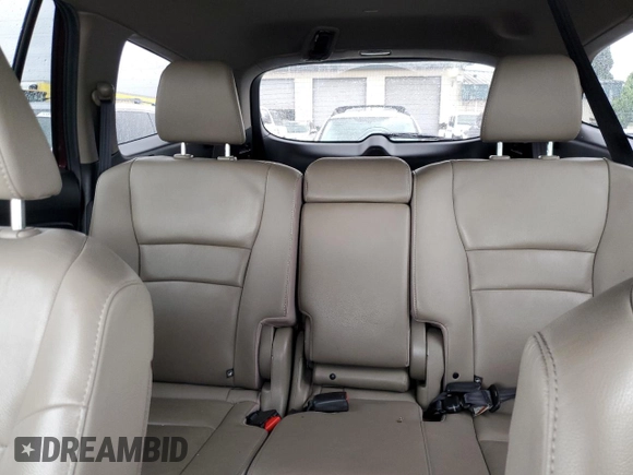 2019 Honda Pilot Touring 8-Passenger with VIN 5FNYF6H94KB056213, listed as a Copart auction lot 56429585 with 106,735 mi miles and Salvage title. Bid and sale history available at DreamBid. Image 10.