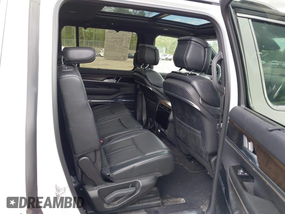 2022 Jeep Grand Wagoneer Series I with VIN 1C4SJVEJ4NS123980, listed as a IAAI auction lot 42232770 with 59,074 mi miles and . Bid and sale history available at DreamBid. Image 8.