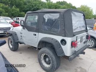 2005 Jeep Wrangler X z VIN 1J4FA39S95P370868, wystawiony jako IAAI lot #42476186 z przebiegiem 144 986 mil mil oraz . Historia ofert i sprzedaży dostępna na DreamBid. Obrazek 3.