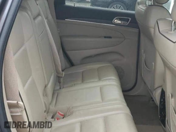 2015 Jeep Grand Cherokee Overland with VIN 1C4RJFCG0FC848046, listed as a Copart auction lot 49514795 with 212,688 mi miles and Clean title. Bid and sale history available at DreamBid. Image 11.