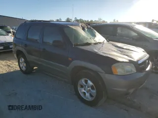 2002 Mazda Tribute LX with VIN 4F2YU09172KM62596, listed as a Copart auction lot 76912034 with 225,892 mi miles and Salvage Title. Bid and sale history available at carsss.com. Image 8.