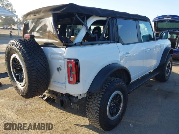 2021 Ford Bronco z VIN 1FMEE5DP7MLA93692, wystawiony jako IAAI lot #42222219 z przebiegiem 18 982 mil mil oraz . Historia ofert i sprzedaży dostępna na DreamBid. Obrazek 4.