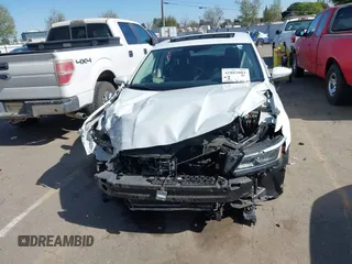 2017 Volkswagen Passat SE z VIN 1VWGT7A30HC053652, wystawiony jako IAAI lot #41882003 z przebiegiem 45 113 mil mil oraz . Historia ofert i sprzedaży dostępna na DreamBid. Obrazek 13.