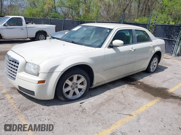 2006 Chrysler 300 with VIN 2C3LA43R16H250237, listed as a IAAI auction lot 42002745 with 157,911 mi miles. Bid and sale history available at carsss.com. Image 2.
